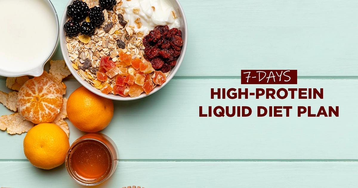 op view of a healthy breakfast bowl with muesli, yogurt, dried fruits, blackberries, fresh mandarins, and honey on a mint green wooden table โ 7-Day High-Protein Liquid Diet Plan
