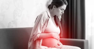 When does ectopic pregnancy pain start pregnant woman home feels sick